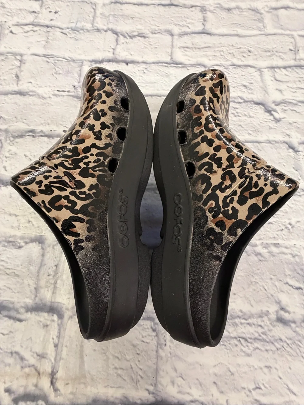 OOFOS ladies size 6 leopard print slip ons. Cushiony and comfortable
